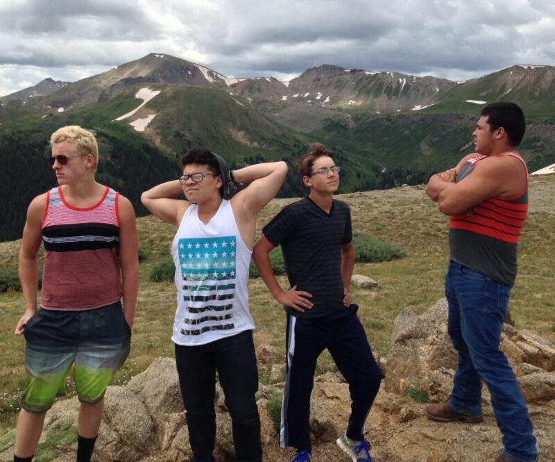 Young_men_posing_in_mountains